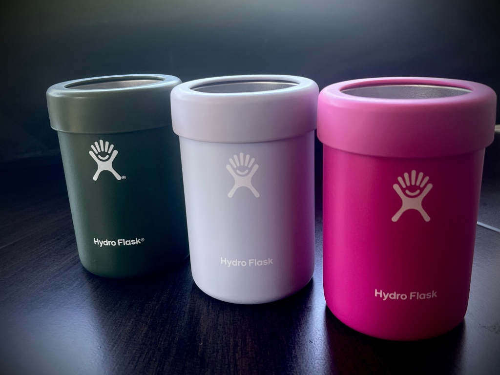 Three Hydro Flask cooler cups lined up in a crescendo formation
